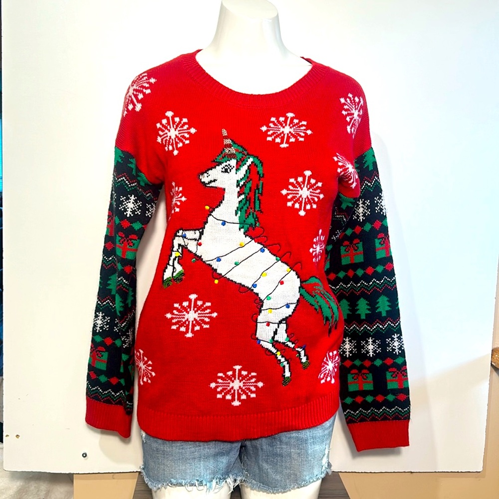 UGY CHRISTMAS SWEATER WITH UNICORN AND SNOW FLAKES IN SIZE XL KIDS OR SMALL LADY